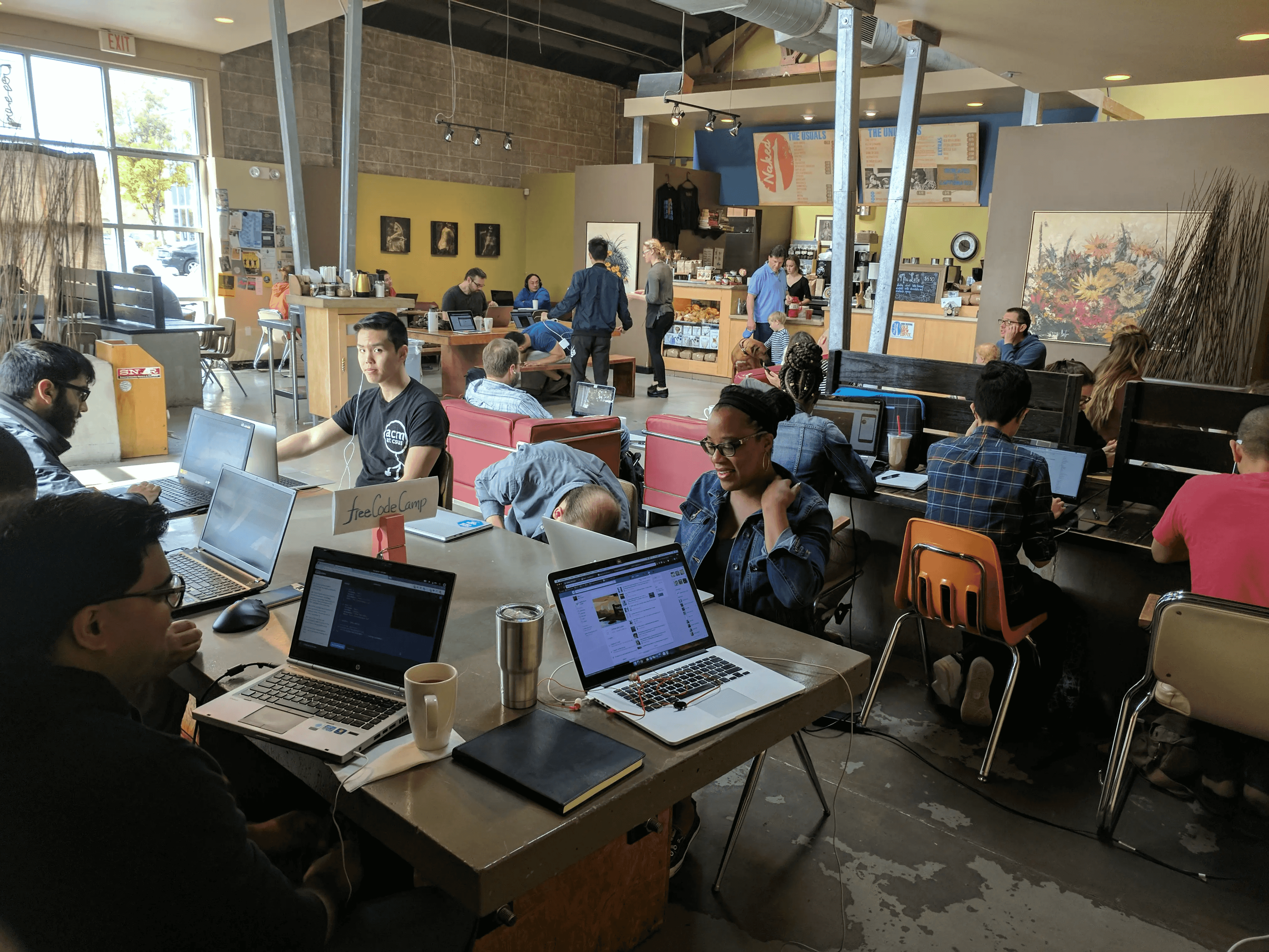 A freeCodeCamp community event held at a coffee shop